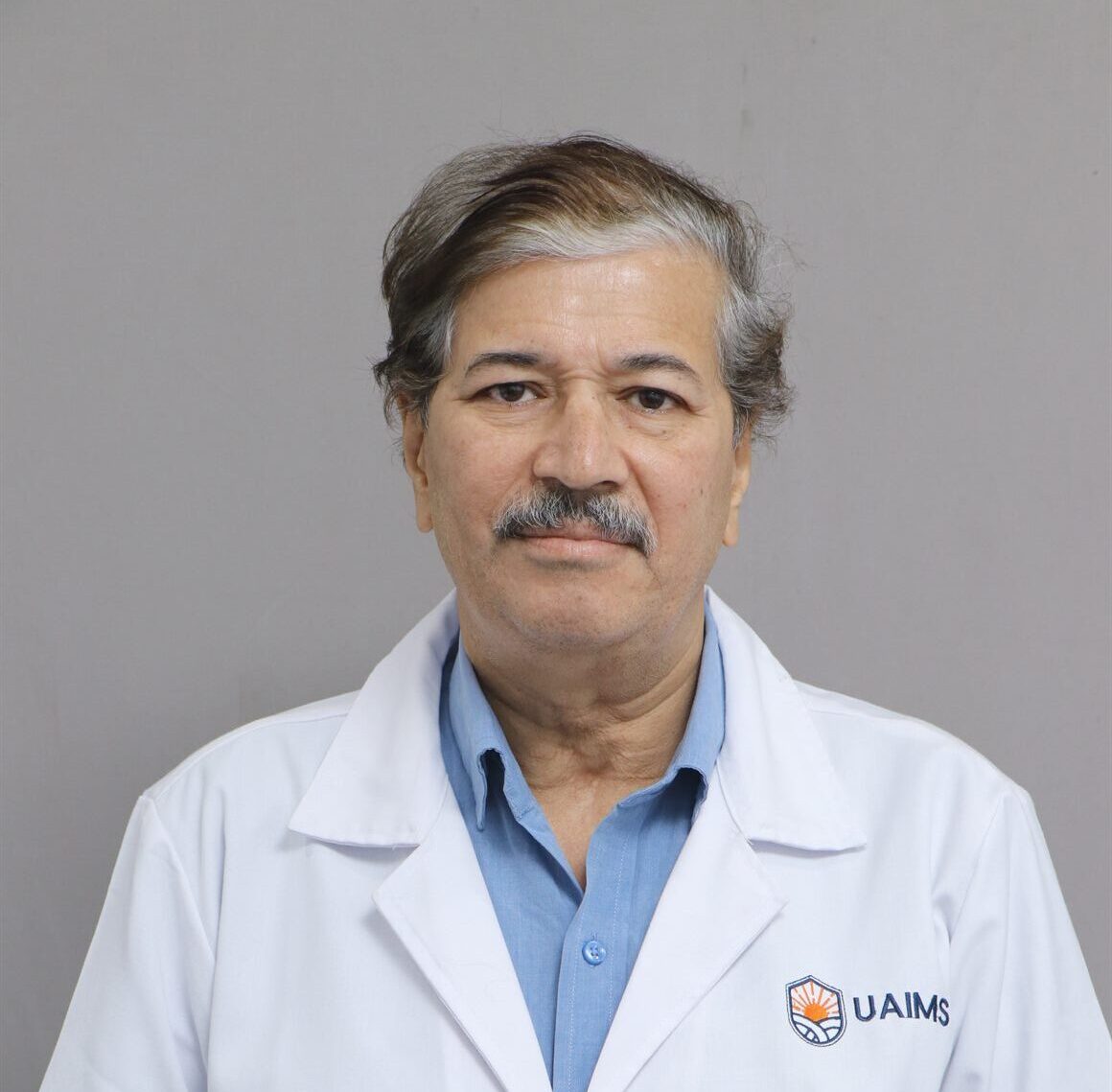 DR. AJIT MODAK