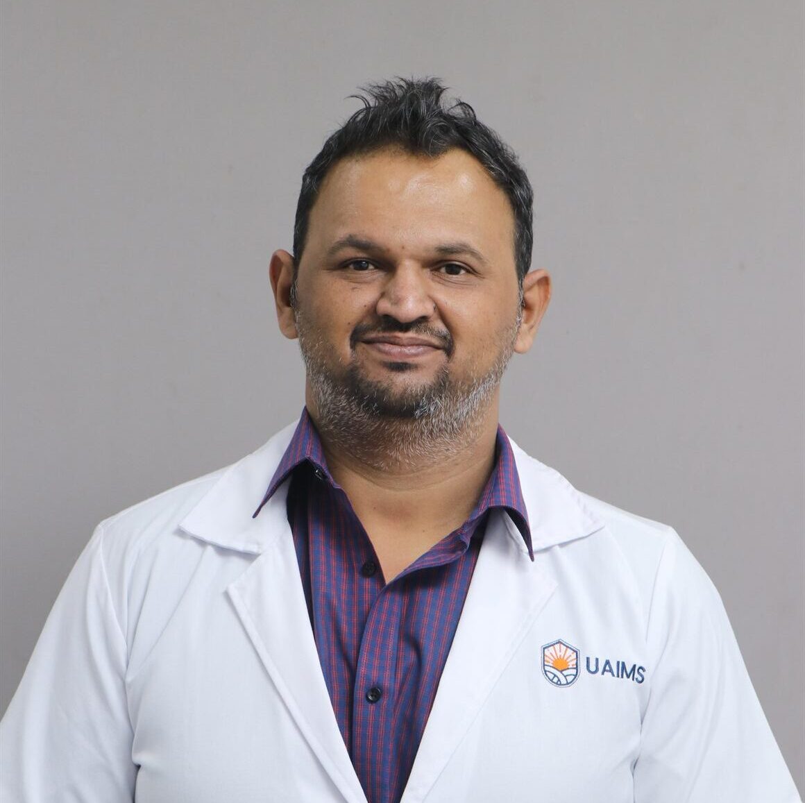 DR. MIHIR BIRNALE